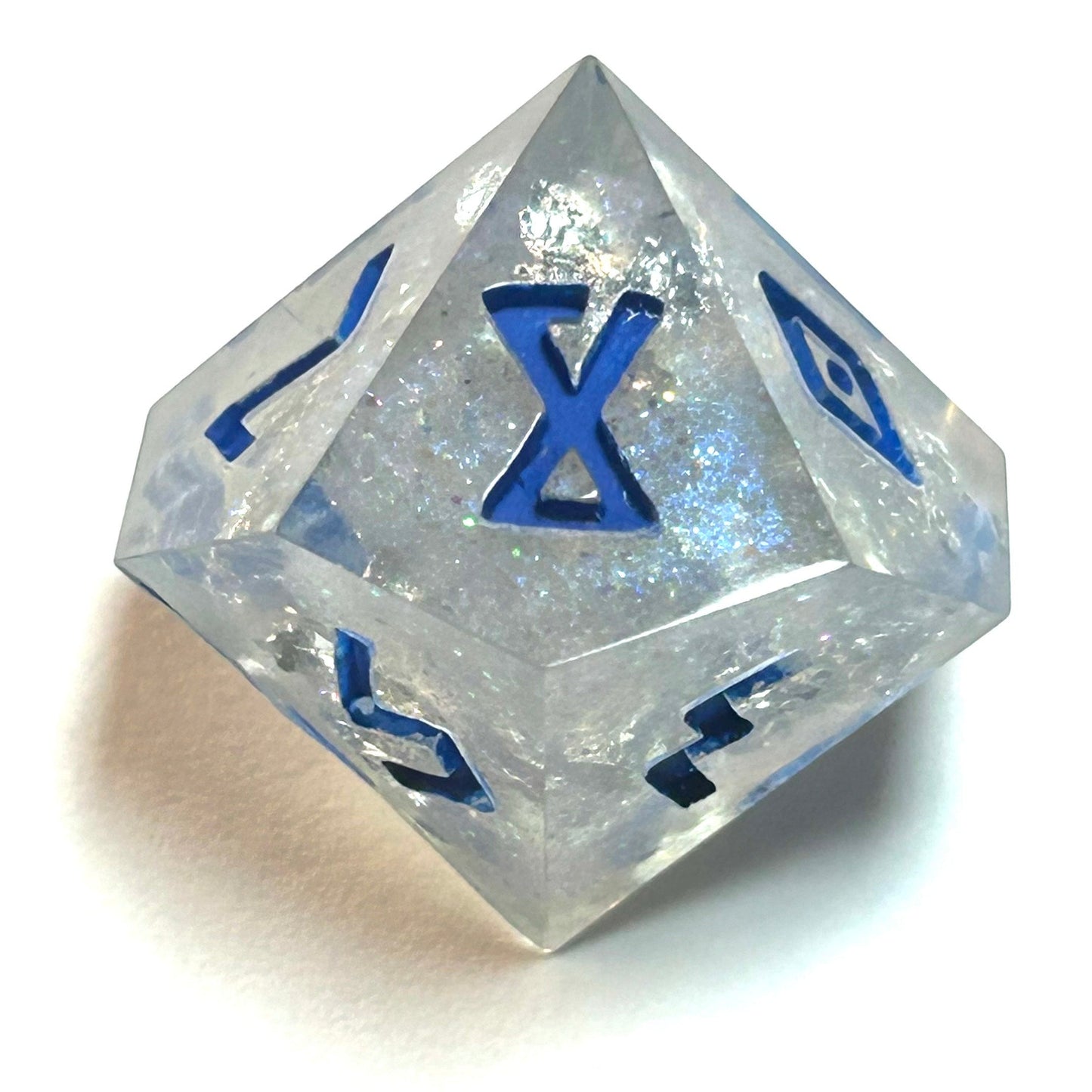 Clear resin dice d10 with silver shimmer and deep blue numbering, resembling fractured ice — Infernal Crafts Glacial Veil handmade resin dice