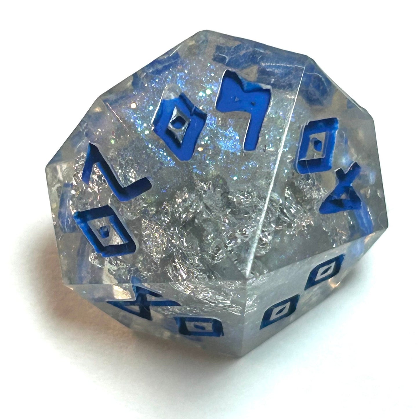 Clear resin dice d percentage with silver shimmer and deep blue numbering, resembling fractured ice — Infernal Crafts Glacial Veil handmade resin dice