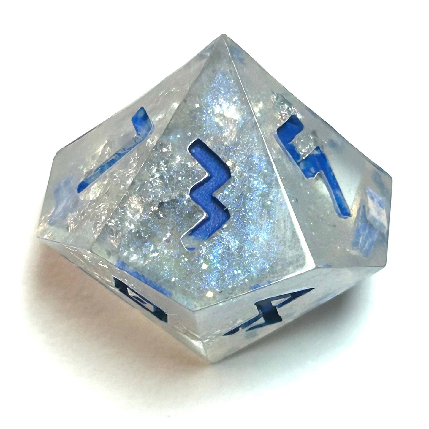 Clear resin dice d12 with silver shimmer and deep blue numbering, resembling fractured ice — Infernal Crafts Glacial Veil handmade resin dice