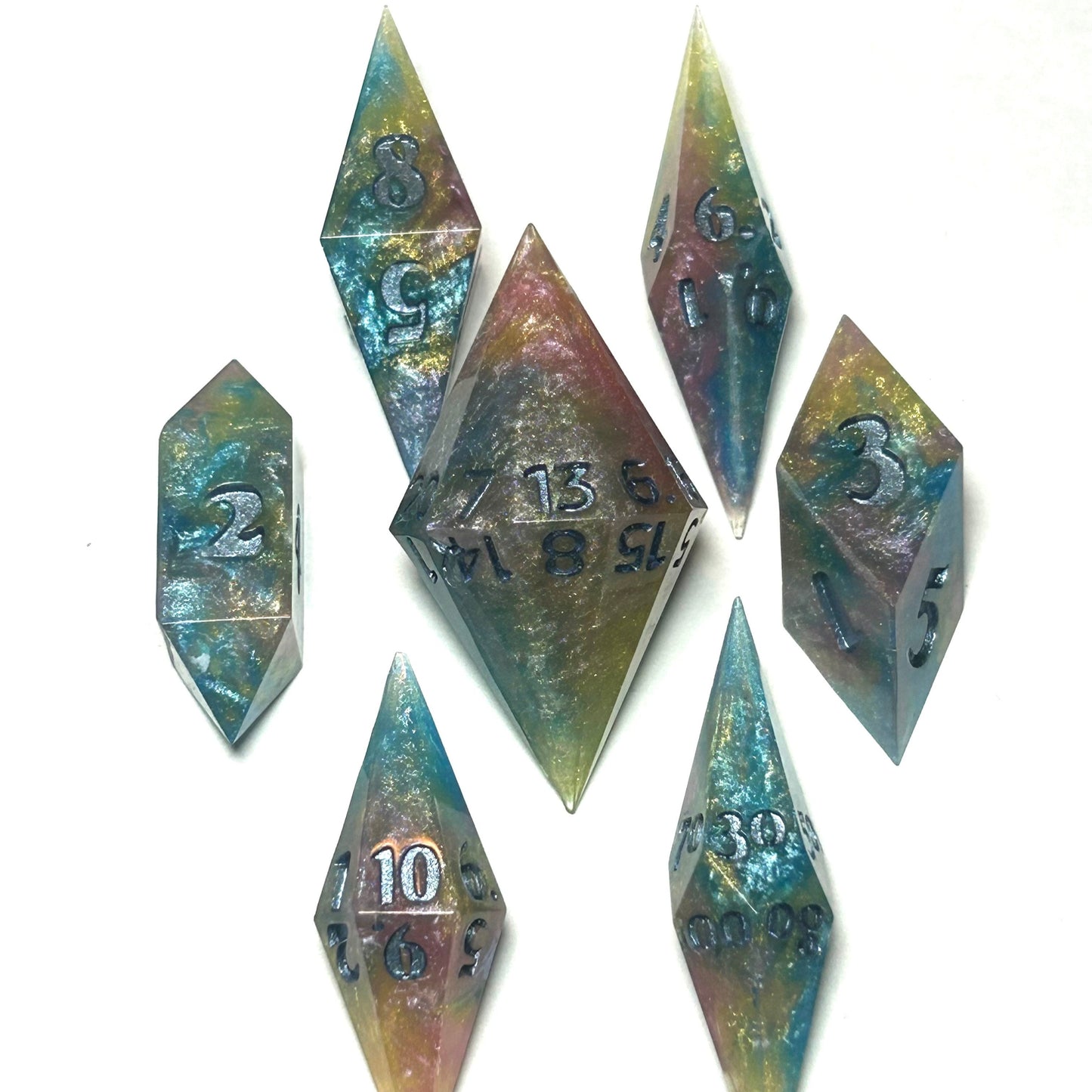 Multicolor stabby dice set with shimmering blue, gold, and violet resin and dark numbering — Infernal Crafts Aetherstorm handmade stabby dice set