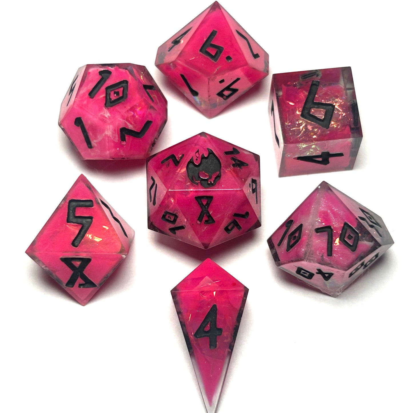 Magenta handmade resin dice set with black rune engravings and fiery shimmer — Infernal Crafts Infernal Rose dice set.