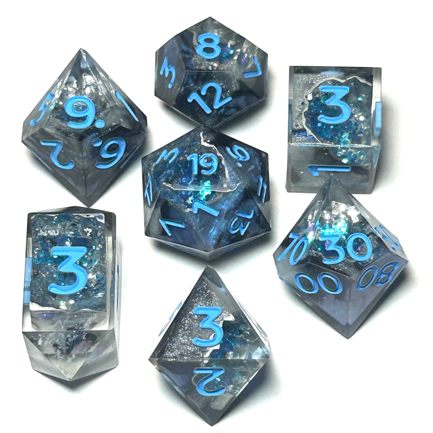 Jumbo handmade resin geode dice set with blue crystalline core and clear resin shell — Infernal Crafts Frostcore Geode dice set