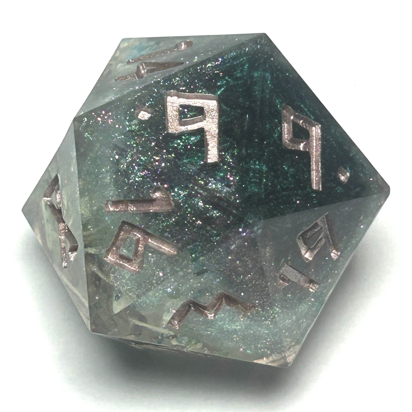 Transparent 35mm chonk D20 die with real mouse bones preserved inside, glittering resin background, and bold gold numbering.
