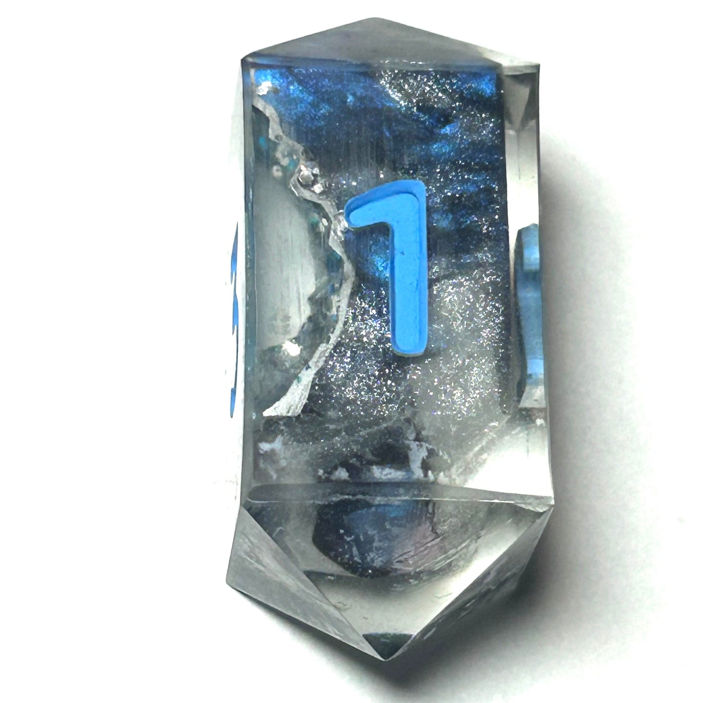 handmade resin geode d4 dice with blue crystalline core and clear resin shell — Infernal Crafts Frostcore Geode dice set