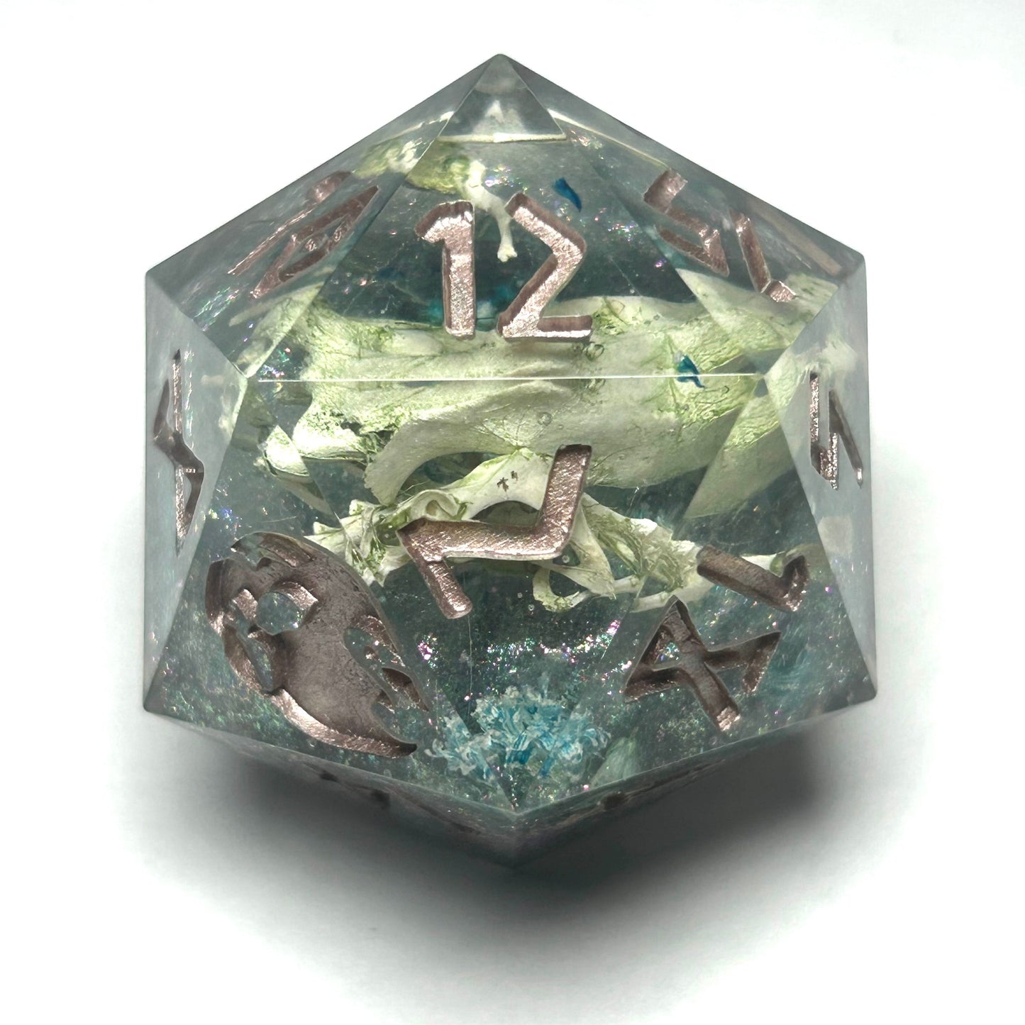 Large 35mm chonk D20 featuring real mouse bones encased in resin, highlighted by sparkling green and silver glitter with engraved gold numbers.