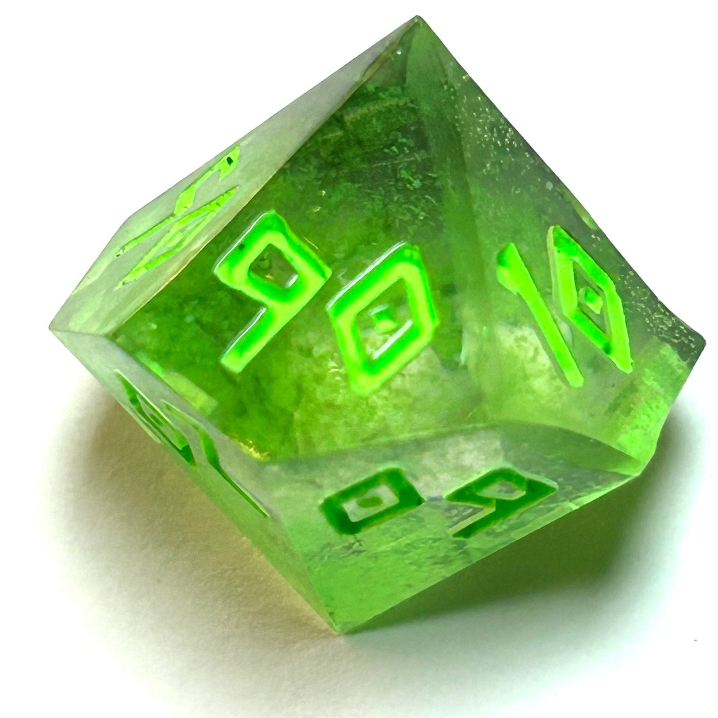 Translucent neon green resin d% with matching engraved numbering — Infernal Crafts Neon Alchemy handmade resin dice