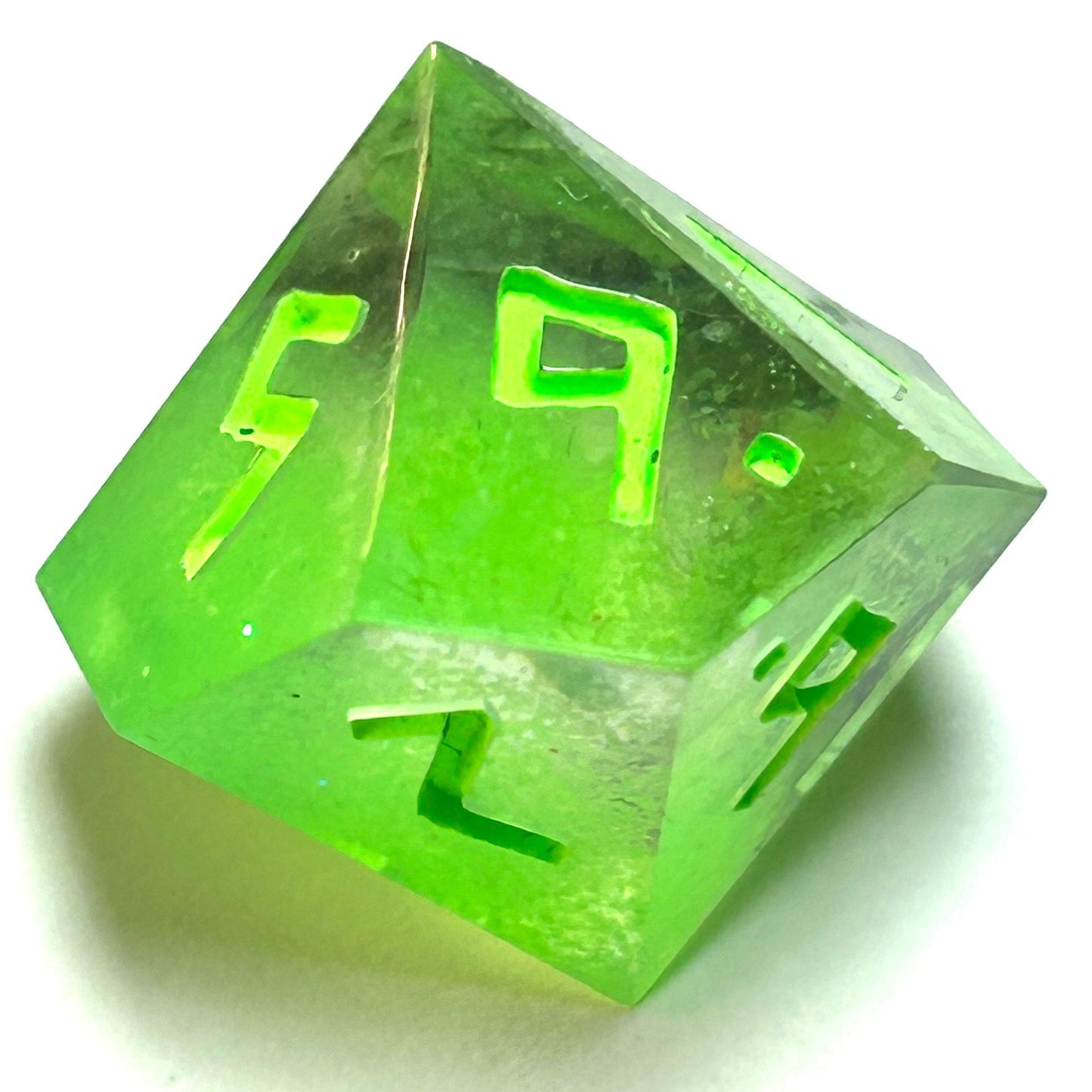 Translucent neon green resin d10 with matching engraved numbering — Infernal Crafts Neon Alchemy handmade resin dice