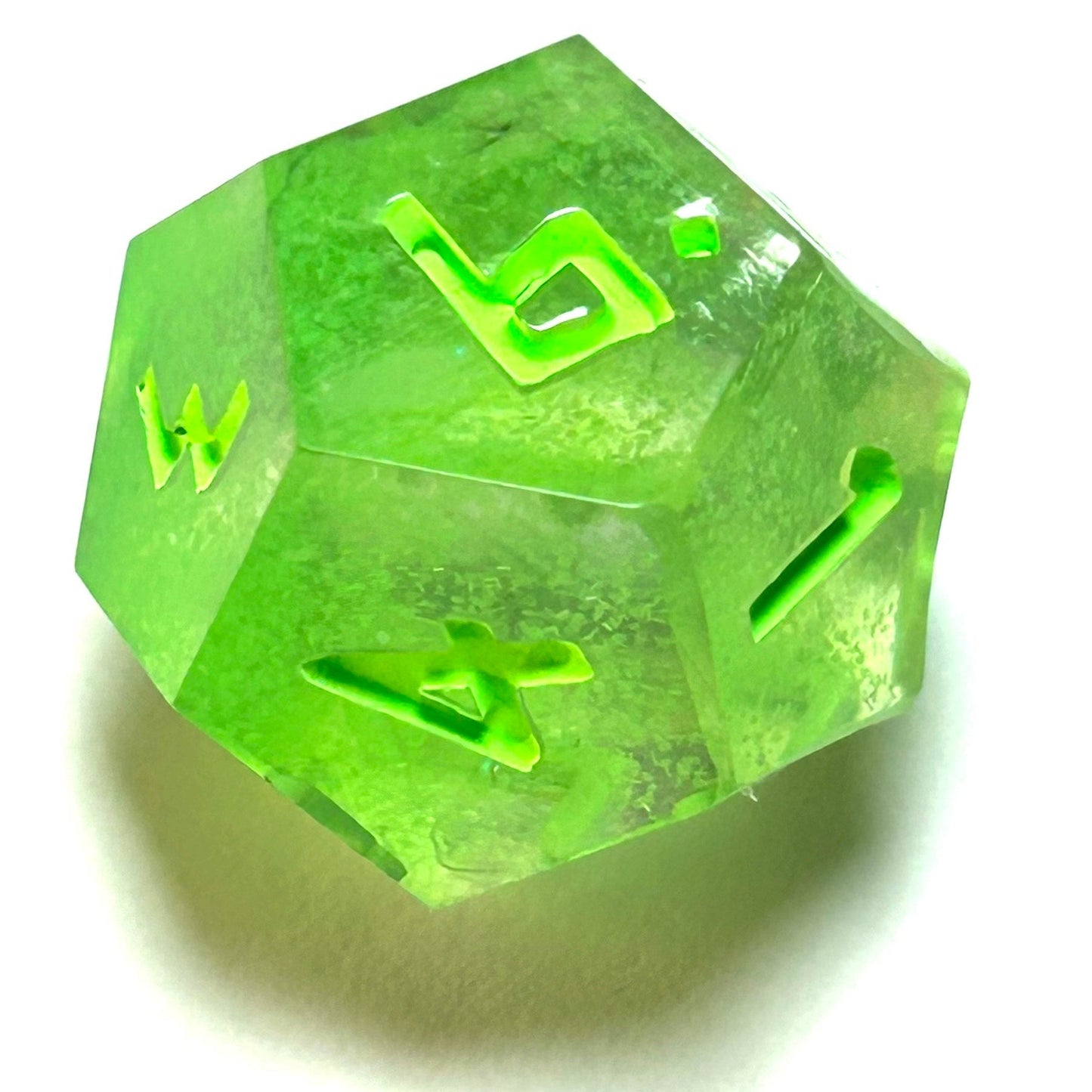 Translucent neon green resin d12 with matching engraved numbering — Infernal Crafts Neon Alchemy handmade resin dice