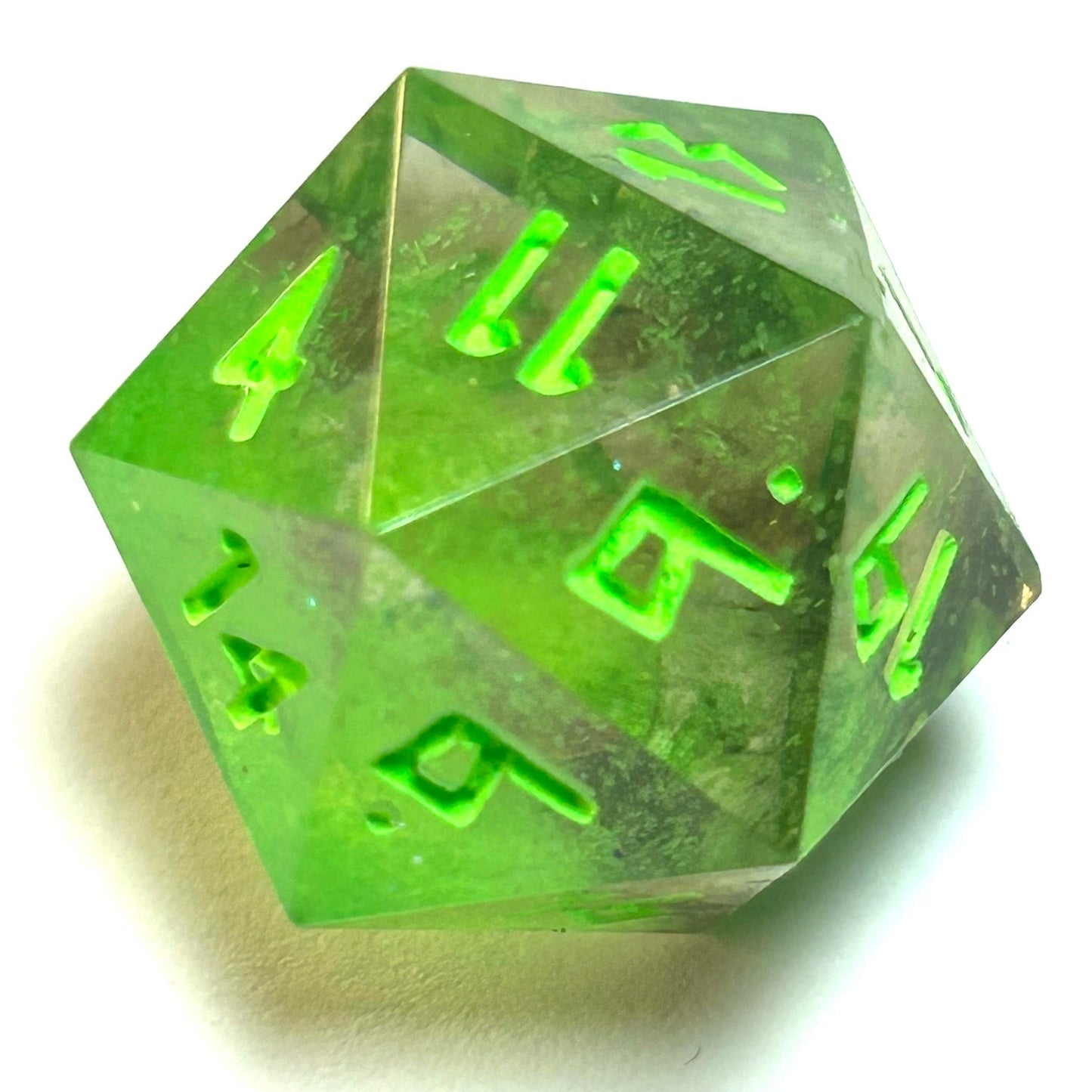 Translucent neon green resin d20 dice with matching engraved numbering — Infernal Crafts Neon Alchemy handmade resin dice set