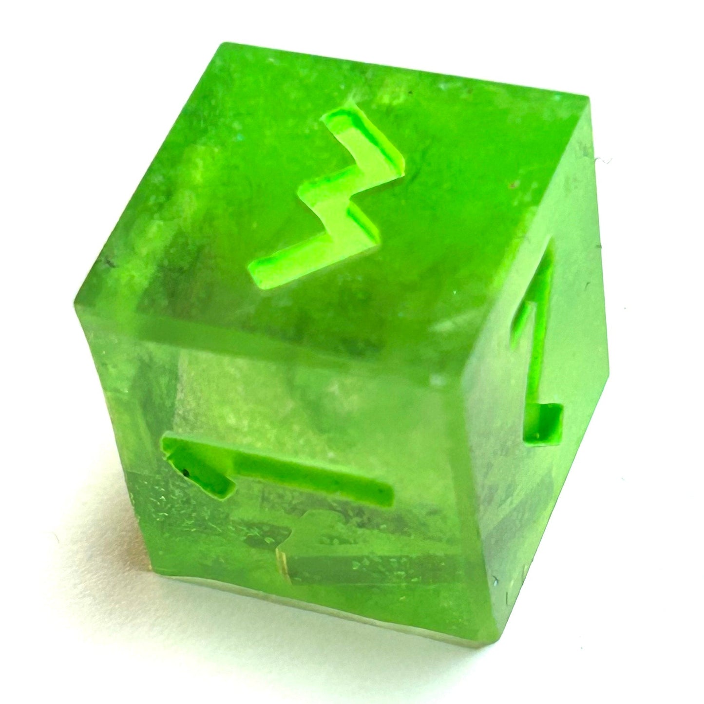 Translucent neon green resin d6 with matching engraved numbering — Infernal Crafts Neon Alchemy handmade resin dice