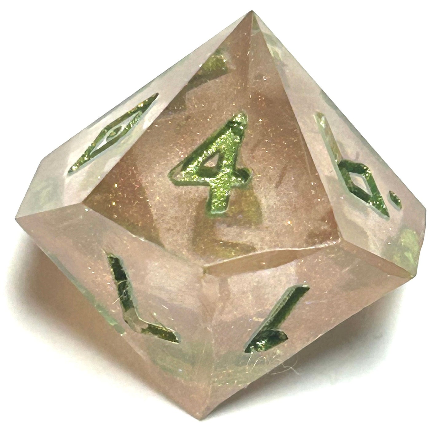 D10 die from the Verdigrace handmade resin dice set, with golden blush resin swirls and vivid green engraved numerals.