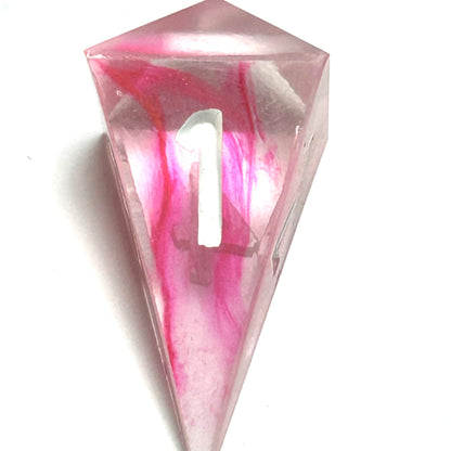 D4 die from the Heartbreaker resin dice set, with translucent clear resin and streaks of red suspended beneath white numbering