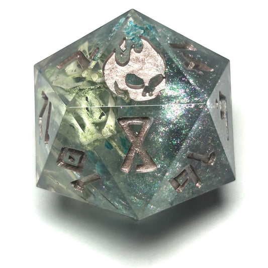 Oversized 35mm resin D20 die with ethically sourced mouse bones from owl pellets, suspended in clear resin with metallic shimmer and gold numbering.