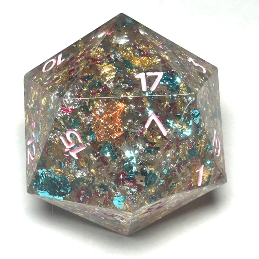 Resin D20 die with shimmering metallic foil in gold, teal, pink, and copper, featuring pink numbers.