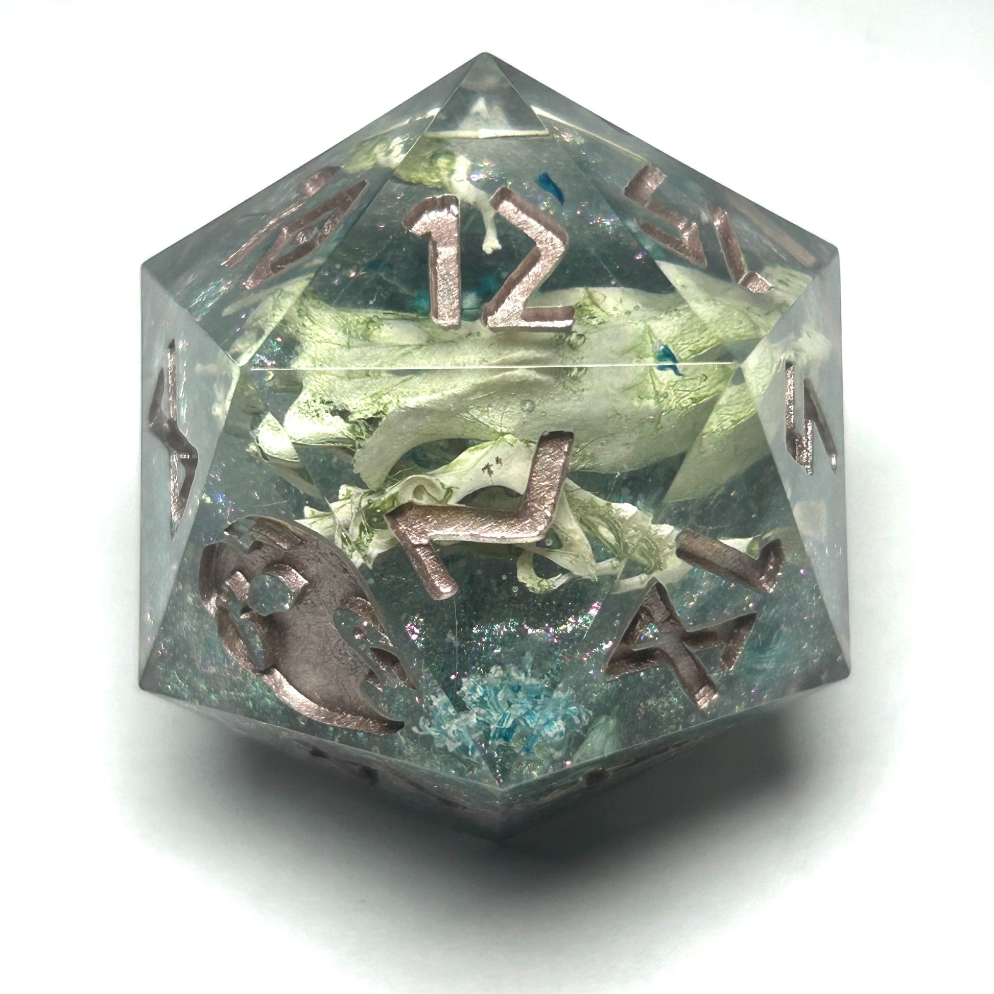 Large 35mm chonk D20 featuring real mouse bones encased in resin, highlighted by sparkling green and silver glitter with engraved gold numbers.