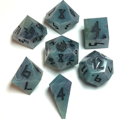 istbourne handmade resin dice set featuring swirling teal and gray resin with bold black numbering — full 7-piece set by Infernal Crafts