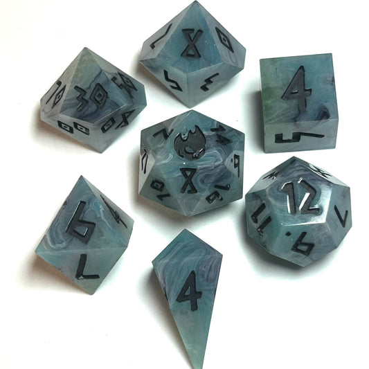istbourne handmade resin dice set featuring swirling teal and gray resin with bold black numbering — full 7-piece set by Infernal Crafts