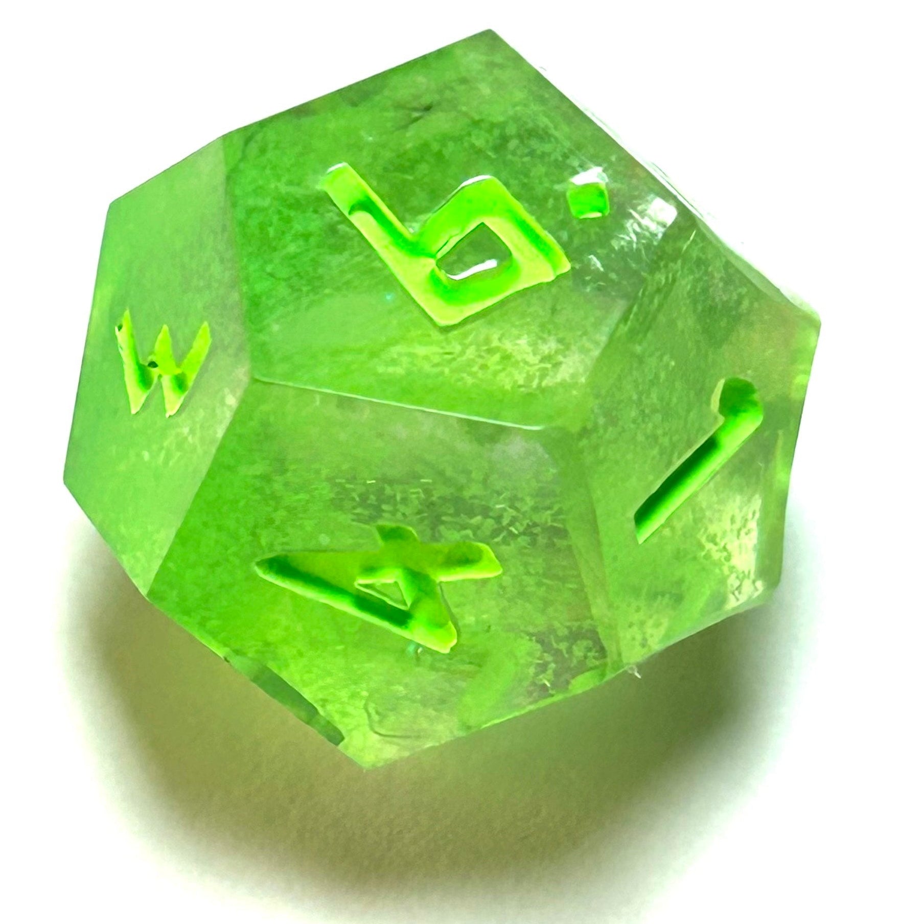 Translucent neon green resin d12 with matching engraved numbering — Infernal Crafts Neon Alchemy handmade resin dice