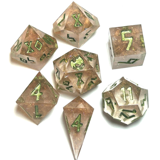 Verdigrace handmade resin dice set featuring a rose-gold shimmer base with bright green numbering — full 7-piece polyhedral set by Infernal Crafts